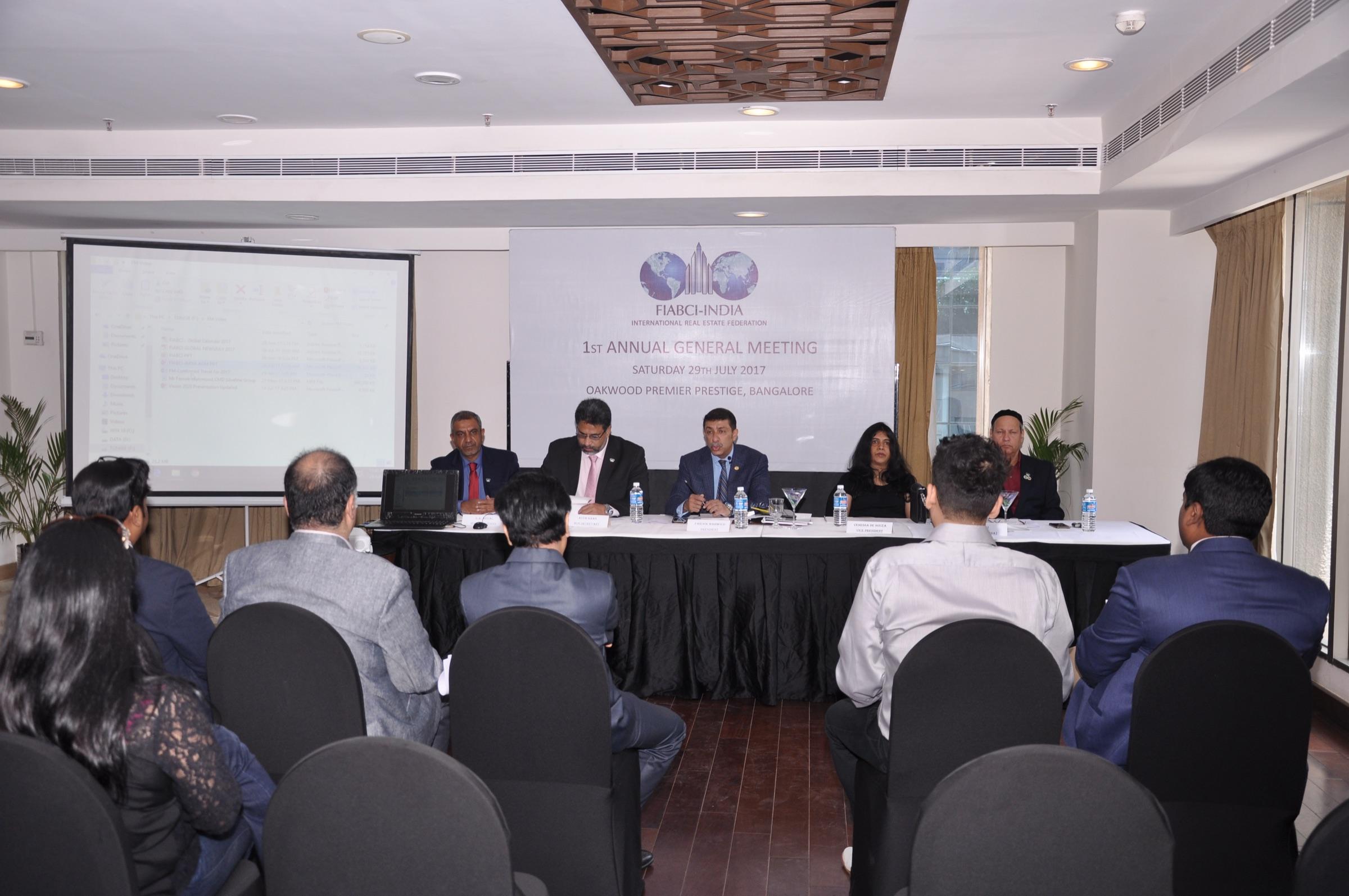 Members seated facing the head table during the proceedings.